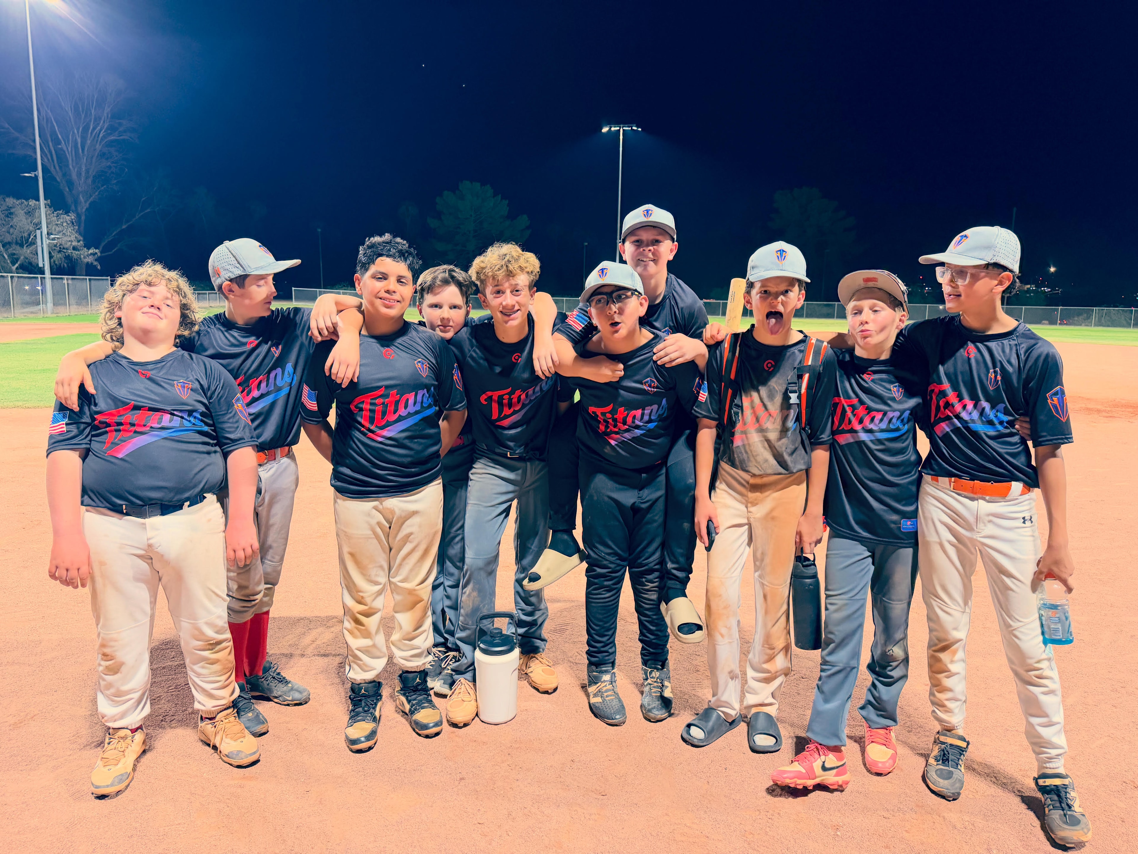 Titans team photo under the lights after a night game