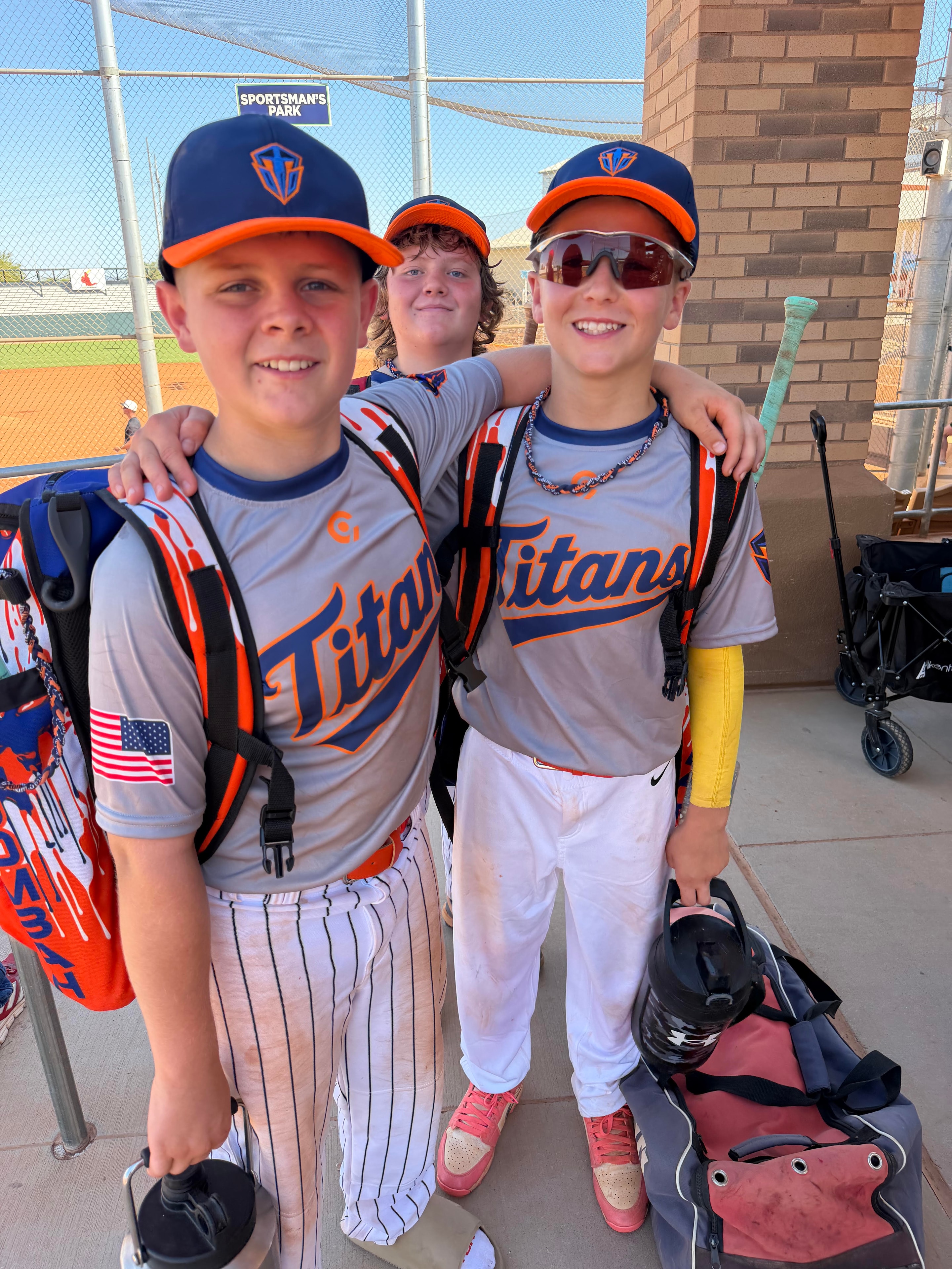 Three Titans players in uniform at Sportsman's Park